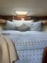 Premier 900 Flybridge:V berth with custom bed