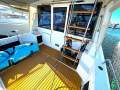 Riviera 34 Flybridge Twin Diesel Shaftdrive