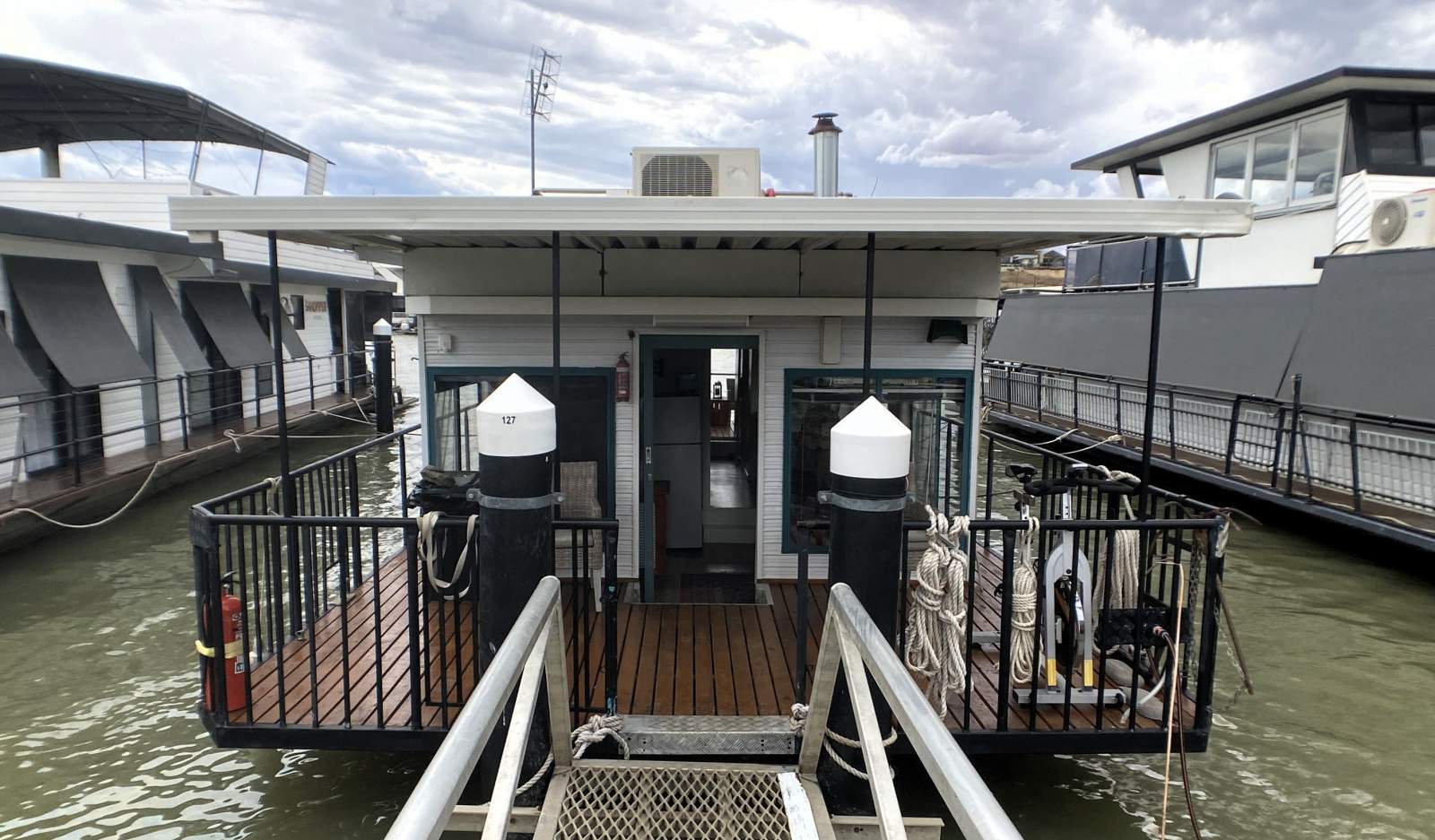 High & Dry. Compact One Bed, Two Decked Houseboat.