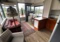 High & Dry. Compact One Bed, Two Decked Houseboat.