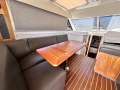 Riviera 3600 Sport Yacht "SHAFT DRIVES and BOW THRUSTER":Port side lounge table extended