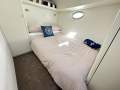 Warwick 60 + 20m Westhaven Marina berth & boat package