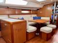 Beneteau Oceanis 50 - Luxury 3-cabin equipped for Offshore Cruising:Large dining table and footstools with centre storage