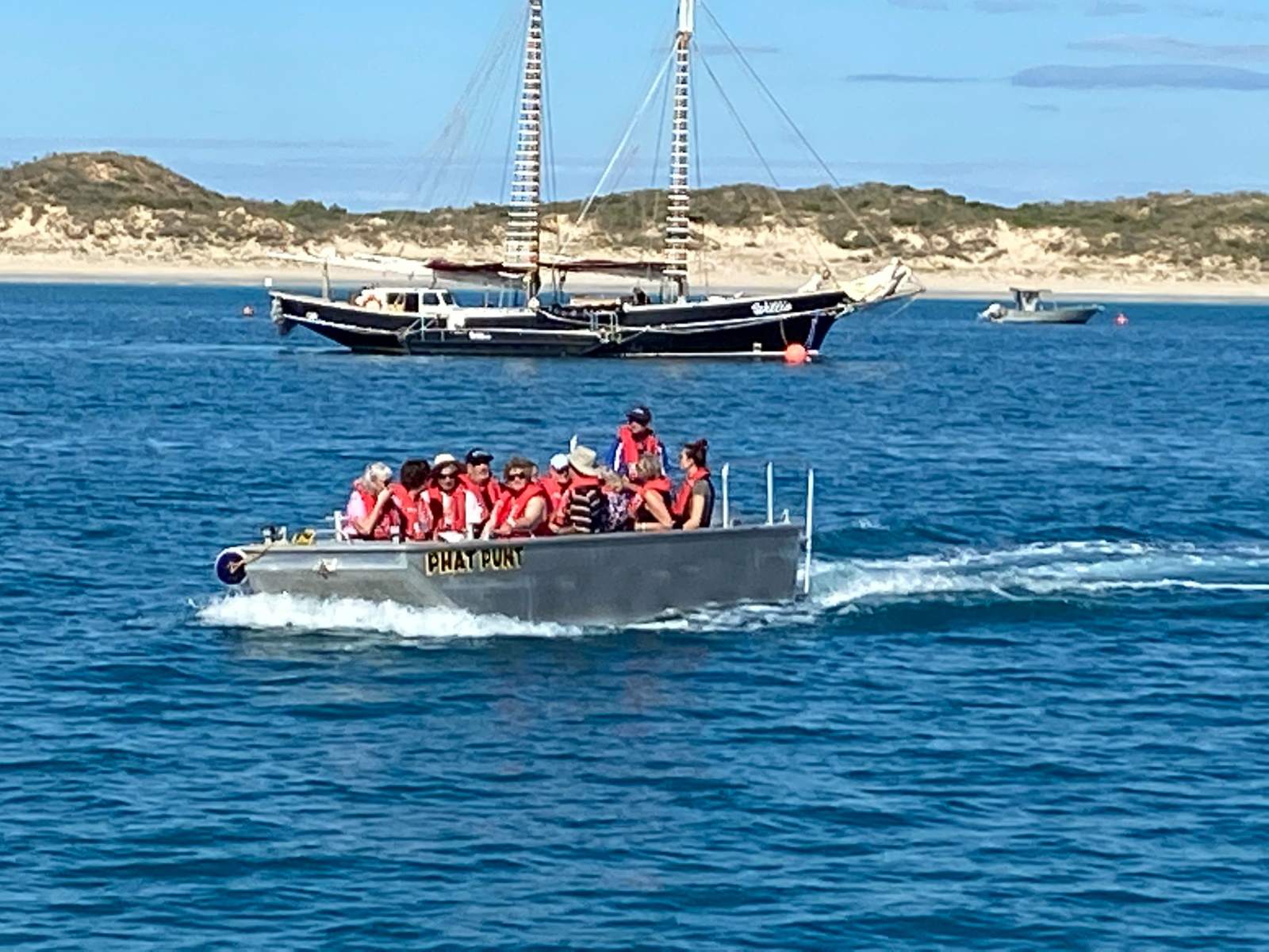 6m WORK PUNT IN SURVEY FOR 12, plus TRAILER:Phat Punt transporting passengers in Broome