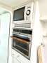 Simpson 42:Microwave and gas stove