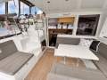 Lagoon 400 S2 2016 (Antifoul and polish 19/2/25 OoW survey free):Spacious cockpit. Direct line of sight helm to Galley and cockpit