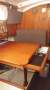 Clansman 30:Port side looking forward. Table can be dropped to form double bunk.