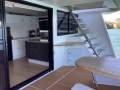Modern Home Cruiser Liveaboard Houseboat:View from cockpit looking into kitchen
