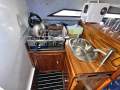 Leeder 710 Deluxe Hardtop " Full Refit 2022 inc NEW 6.2 Mercuiser ":Galley