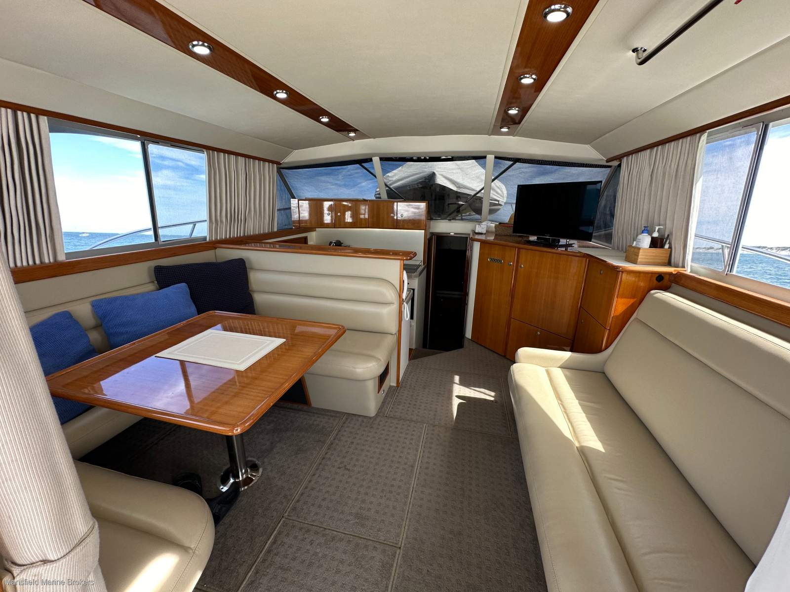 Caribbean 40 Flybridge Cruiser:Gloss teak upgrades