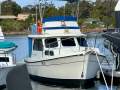 Cuddles 30 Flybridge Cruiser