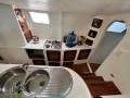 Mumby 48 Sailing Catamaran, S/V Meercat:Outboard Galley: oven, stove, cabinets