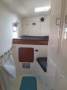 Maxim 380 2005 Owners Version:Watermaker mounted under owners berth