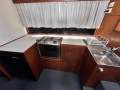 Northshore 37 Flybridge Cruiser " DIESEL SHAFT, BOW THRUSTER, DUAL HELMS ":Galley
