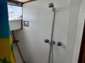 Northshore 37 Flybridge Cruiser " DIESEL SHAFT, BOW THRUSTER, DUAL HELMS ":Bathroom shower
