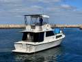 Northshore 37 Flybridge Cruiser " DIESEL SHAFT, BOW THRUSTER, DUAL HELMS ":NORTHSHORE 37 by YACHTS WEST