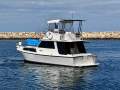 Northshore 37 Flybridge Cruiser " DIESEL SHAFT, BOW THRUSTER, DUAL HELMS ":NORTHSHORE 37 by YACHTS WEST
