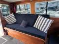 Northshore 37 Flybridge Cruiser " DIESEL SHAFT, BOW THRUSTER, DUAL HELMS ":Port Lounge