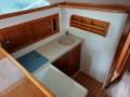 Riviera 37 Flybridge Twin 370hp Cummins. Set up for offshore fishing