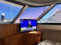 Thomascraft 38 Flybridge Cruiser " Repowered with 2 x 400hp Diesels ":Tv on electric actuator in upright postion