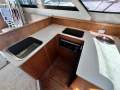 Thomascraft 38 Flybridge Cruiser " Repowered with 2 x 400hp Diesels ":U shaped Galley