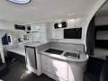 Mustang 3800 Sportcruiser " BOW THRUSTER and AIRCOND ":Galley looking Aft