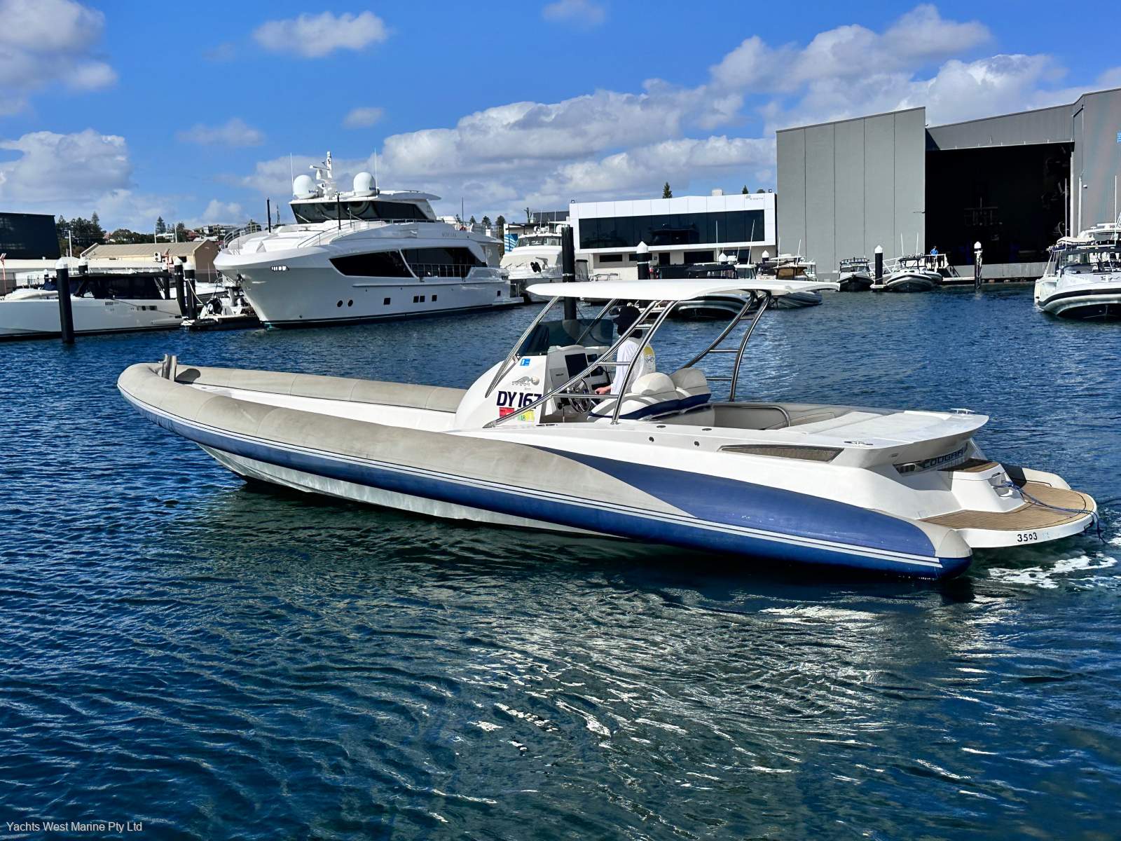 Cougar R11 centre console with " BOAT HOUSE STORAGE ":COUGAR R11 by YACHTS WEST 9335 7788