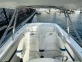 Cougar R11 centre console with " BOAT HOUSE STORAGE ":Helm Chairs