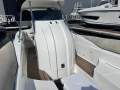 Cougar R11 centre console with " BOAT HOUSE STORAGE ":Lift up Hatch to Toilet