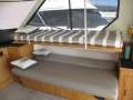 Thomascraft 38 Flybridge Cruiser:Starboard lounge as Beds