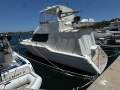 Thomascraft 38 Flybridge Cruiser:Full Covered Rear deck