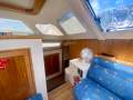 Perry 43 Sailing Catamaran Central elevated helm version:Port hull fwd entrance