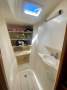Perry 43 Sailing Catamaran Central elevated helm version:Port fwd vanity