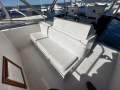 Mariner 3400 Flybridge ( 2 x Shaft drive, Dual Helms & Genset ):flybridge guest seating