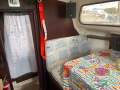 Quest 8:Privacy curtain to V-berth