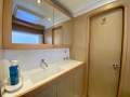 Lagoon 39 Owners Version:Port fwd bathroom