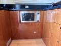 Mustang 43 Sportsfisher " VOLVO Pod drive IPS ":Microwave and dishwasher below