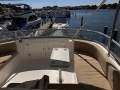 Mustang 43 Sportsfisher " VOLVO Pod drive IPS ":Helm view of guest seating