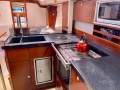Hanse 470E -Elite class offshore-equipped performance cruiser:L-shape galley with multiple 240v sockets and appliances