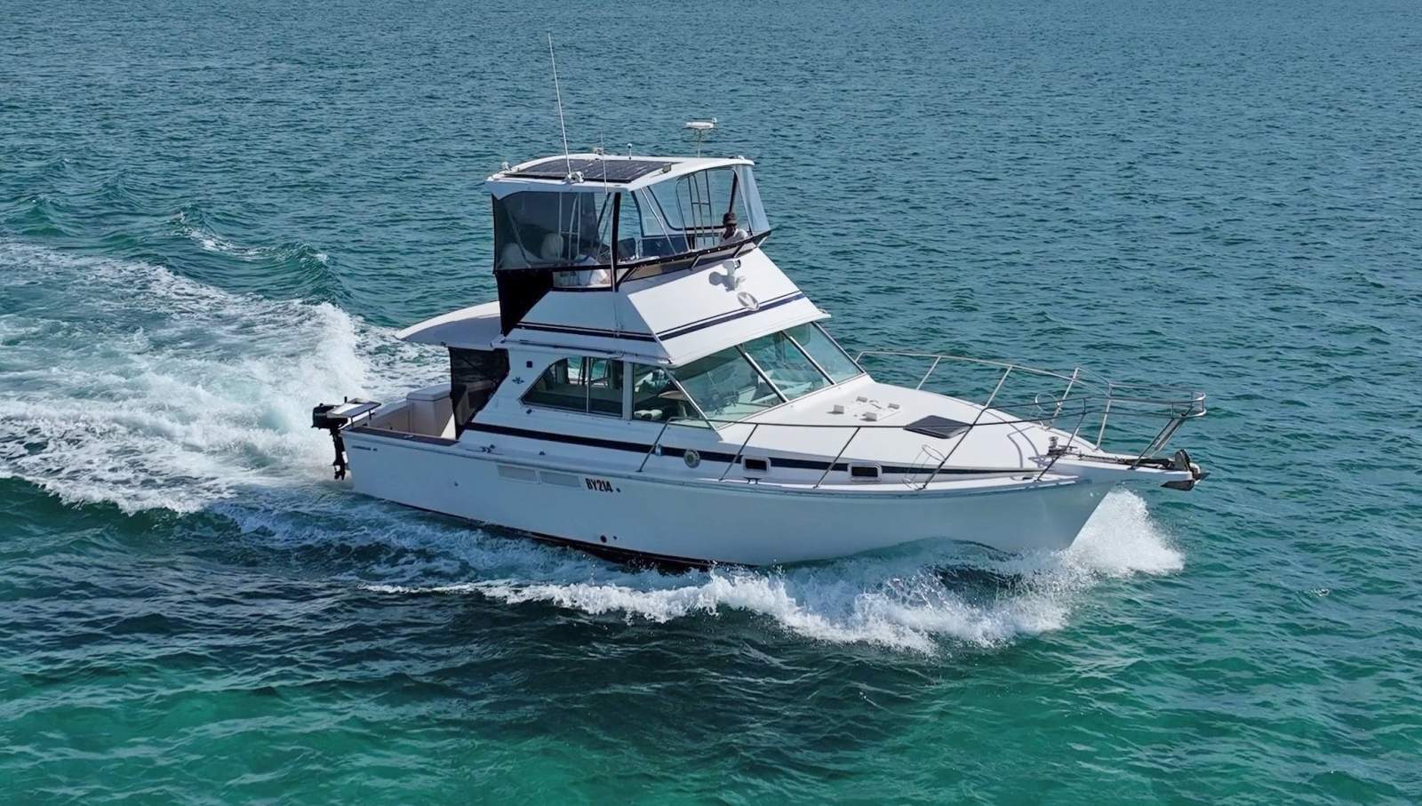 Caribbean 35 Flybridge Cruiser - Twin Caterpillar diesels, sleeps 6