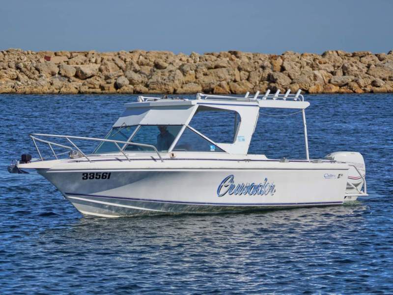 Bertram Caribbean 235 Crusader With pod and outboard