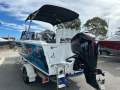 Quintrex 550 Freestyler Ocean riding bowrider and also a family ski boat