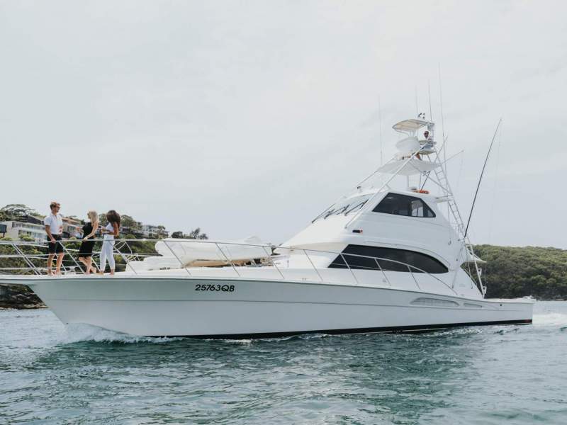 Riviera 58 Enclosed Flybridge Convertible with tuna tower