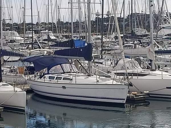 Jeanneau Sun Odyssey 40.3 Twin wheel walk through transom masthead rigged:Scallywag at rest