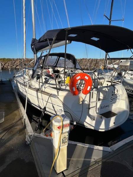 Jeanneau Sun Odyssey 40.3 Twin wheel walk through transom masthead rigged:Full width Bimini
