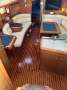 Jeanneau Sun Odyssey 40.3 Twin wheel walk through transom masthead rigged:Looking downstairs