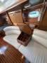 Jeanneau Sun Odyssey 40.3 Twin wheel walk through transom masthead rigged:Settee with bar opposite Table