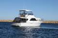 Caribbean 35 Flybridge Cruiser with Twin 330Hp Cummins Diesels
