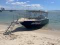 Gold Coast's 'Beachcomber Charters' - 2001 Cairns Custom Craft 9000 Series:Beachcomber at Wavebreak island