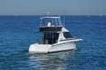 Commodore 33 Flybridge Twin Cabin Cruiser